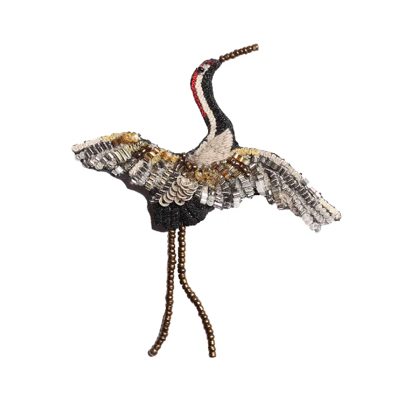 flying crane brooch