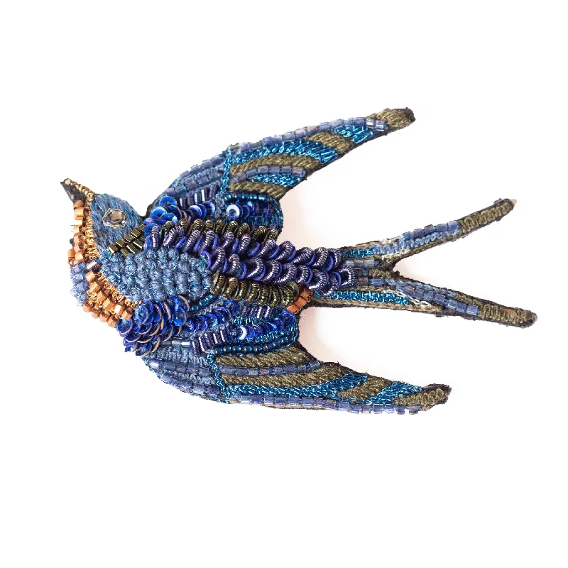 singing swallow brooch